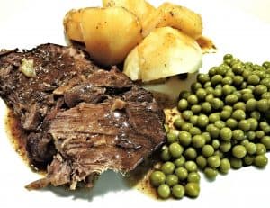 meal with beef, potatoes, and peas