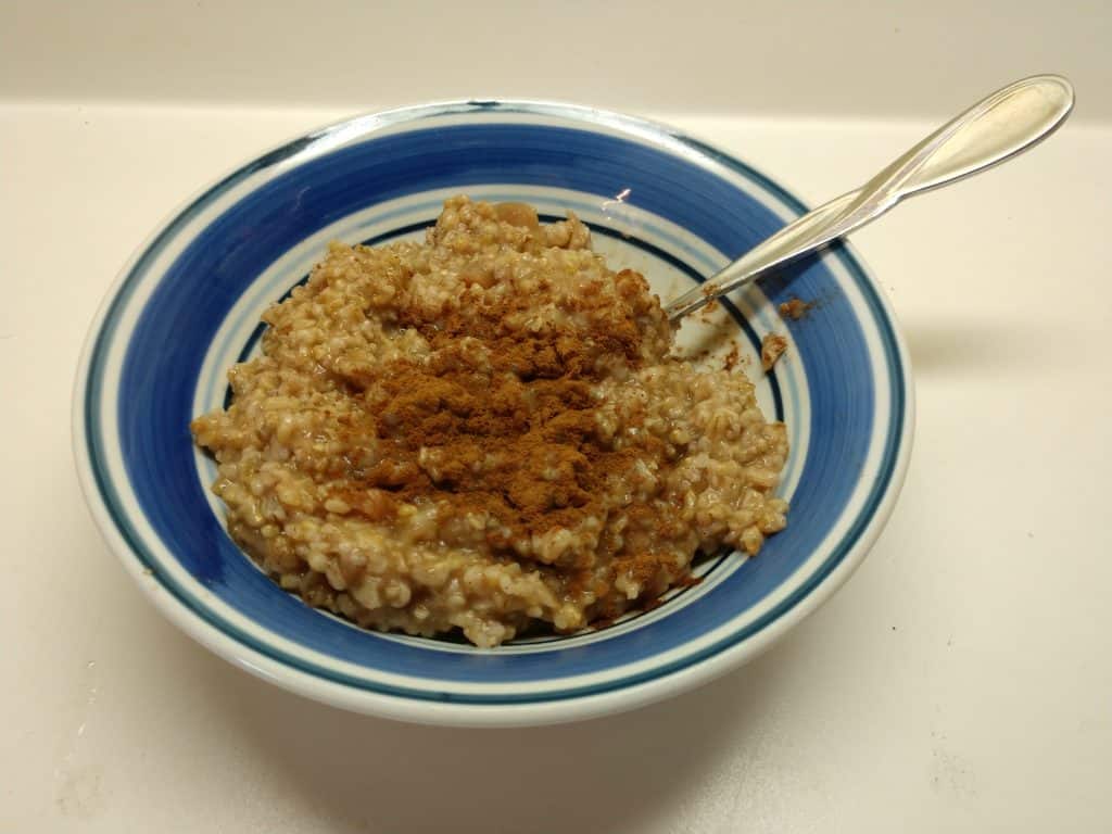 bowl of oatmeal with cinnamon on top