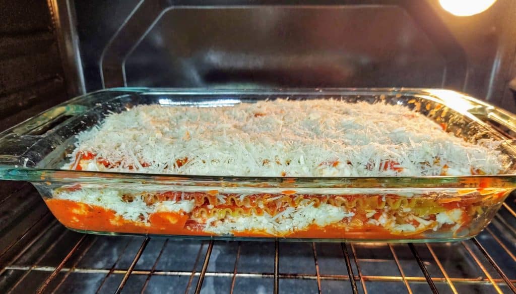 uncooked lasagna in oven