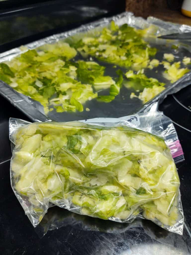 frozen lettuce on baking pan wrapped in foil