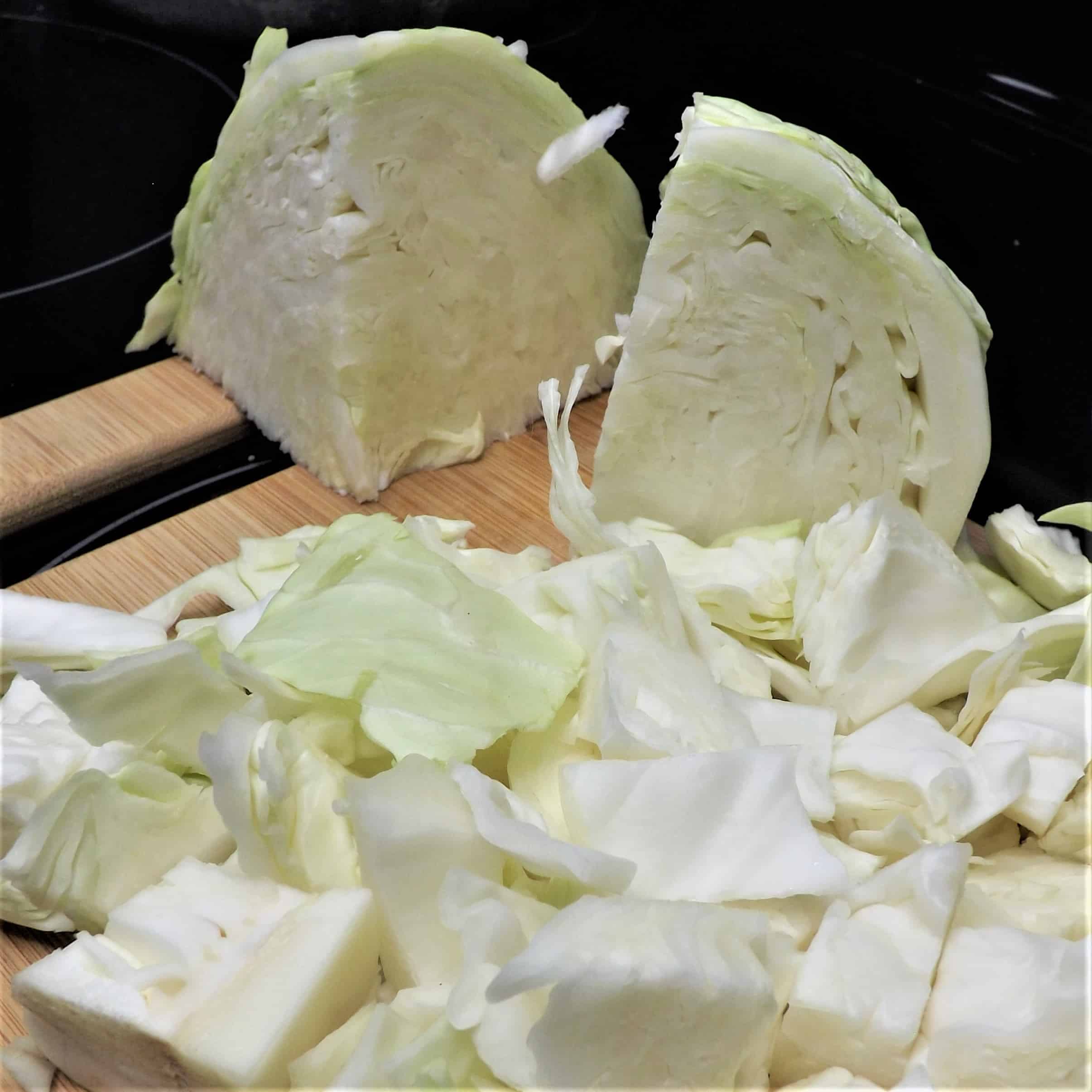 fresh cut cabbage on cutting board